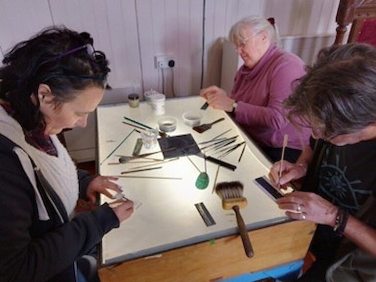 Participants on one of the stained-glass workshops