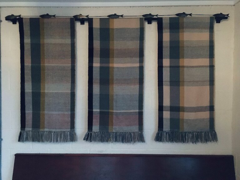 Molly Shearer explored Stronsay's herring fishing industry and the history of weaving on the island to create this wall hanging for the Stronsay pier waiting room.