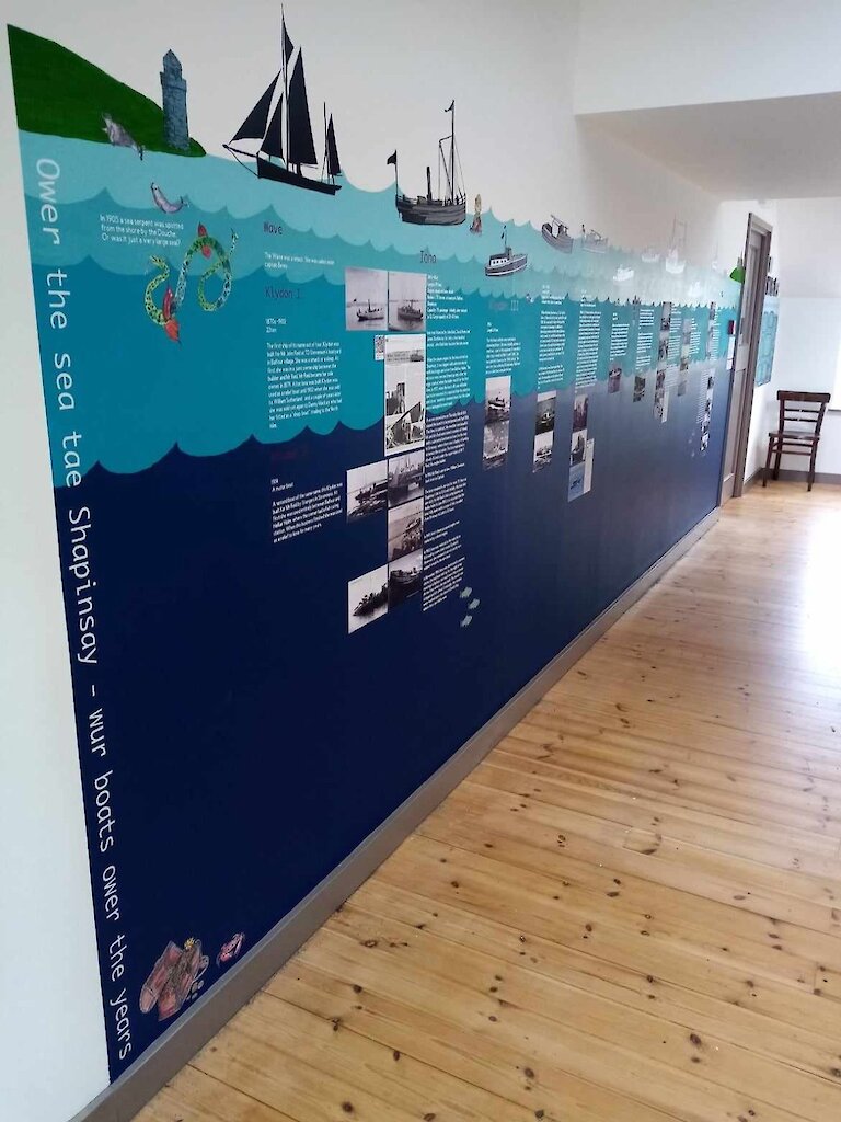 This stunning wall mural - a timeline of Shapinsay boats can be found in the Island's Heritage Centre and was created by Lenka Mellor.